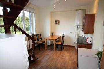 Фото номера Дом с 4 спальнями Дома для отпуска Seaside apartments г. Саулкрасты 8
