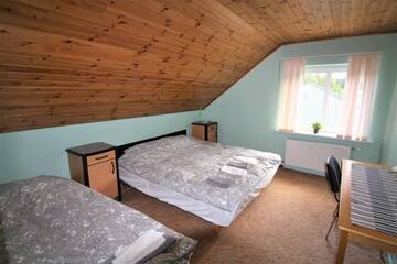 Фото номера Дом с 4 спальнями Дома для отпуска Seaside apartments г. Саулкрасты 15