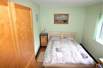 Фото номера Дом с 2 спальнями Дома для отпуска Seaside apartments г. Саулкрасты 7