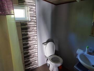 Фото номера Трехместный номер с собственной ванной комнатой Гостевой дом Atpūtas Namiņš pie jūras Saulkrasti г. Саулкрасты 4